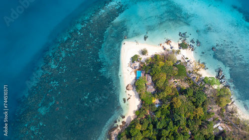 Aerial view of Island in the Andaman Sea. natural blue sea Tropical seas of Thailand The beautiful scenery of the island is very impressive.	
