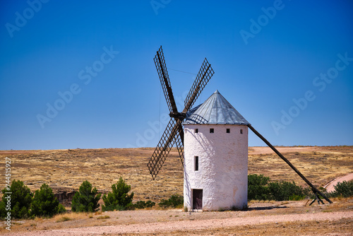 Ancient windmill in Campo de Criptana, Spain, defined in Cervantes' Don Quixote "The Giants"