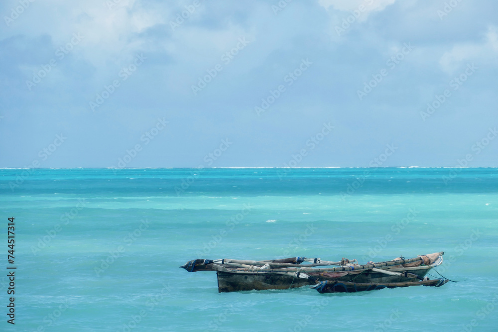 Scenic view of moored boat at Jambiani beach, Zanzibar