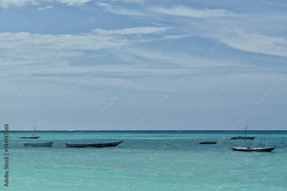Scenic view of moored boats at Jambiani beach, Zanzibar
