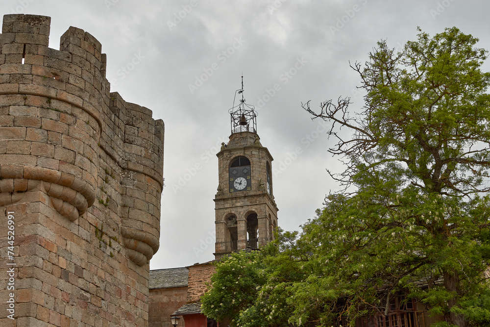Bell tower of the church of Santa Maria del Azogue in the town of Puebla de Sanabria in the province of Zamora - Spain