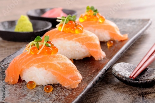 Salmon Sushi With Caviar Chopsticks