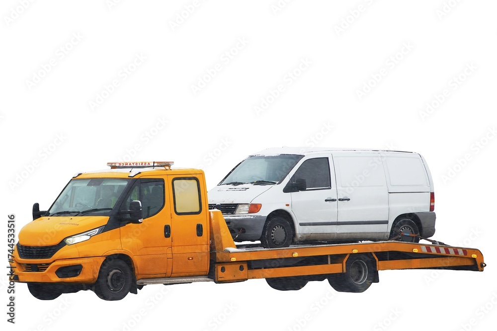 Emergency roadside assistance in action as a tow truck carries a broken down SUV on the highway. Emergency roadside assistance in action as a tow truck carries a broken down SUV on the highway.