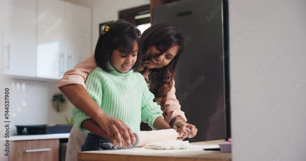Home, learning and mother with girl, baking and kitchen cooking with flour and child development. Family, mama and kid with sweet food, smile and bonding together with hobby and love with activity Home, learning and mother with girl, baking and kitchen cooking with flour and child development. Family, mama and kid with sweet food, smile and bonding together with hobby and love with activity