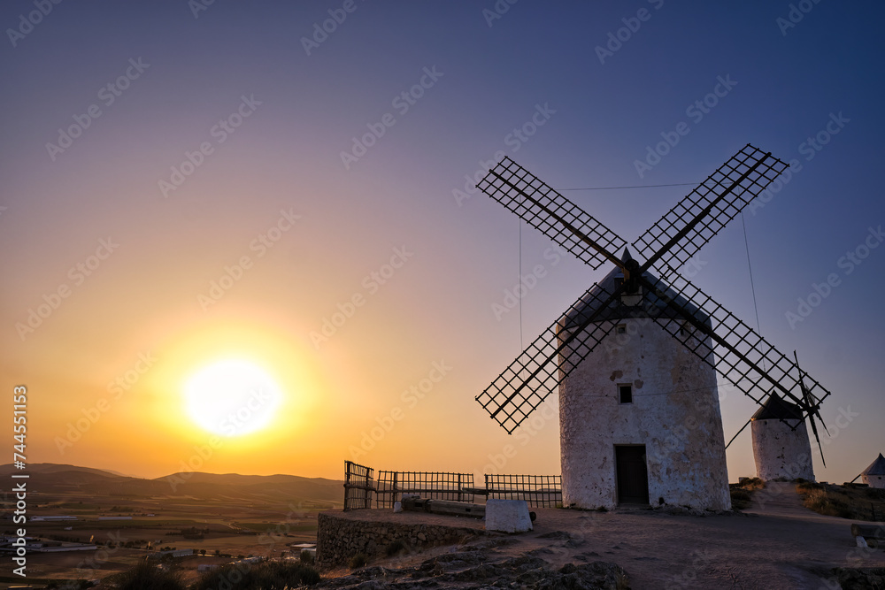 Group of ancient windmills in the town of Consuegra Spain , on the route of the Don Quixote and Cervantes mills