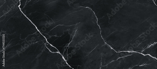 black marble background. black Portoro marbl wallpaper and counter tops. black marble floor and wall tile. black travertine marble texture. natural granite stone.