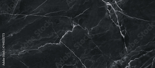 black marble background. black Portoro marbl wallpaper and counter tops. black marble floor and wall tile. black travertine marble texture. natural granite stone. photo