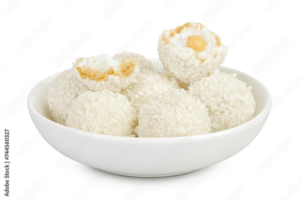 round candy raffaello with coconut flakes and nut in ceramic bowl isolated on white background round candy raffaello with coconut flakes and nut in ceramic bowl isolated on white background