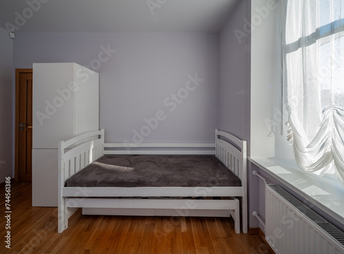 Living room in the modern flat. Lighti from th ewindow.