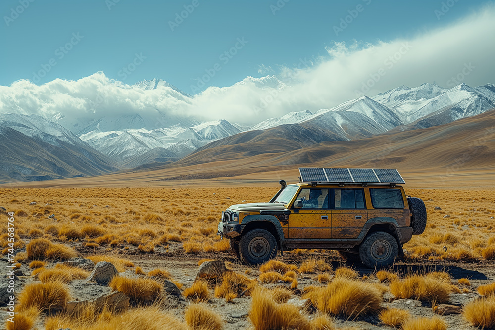 A rugged off-road vehicle with a solar panel on its roof stands ready for adventure against a breathtaking mountainous landscape, blending exploration with sustainability