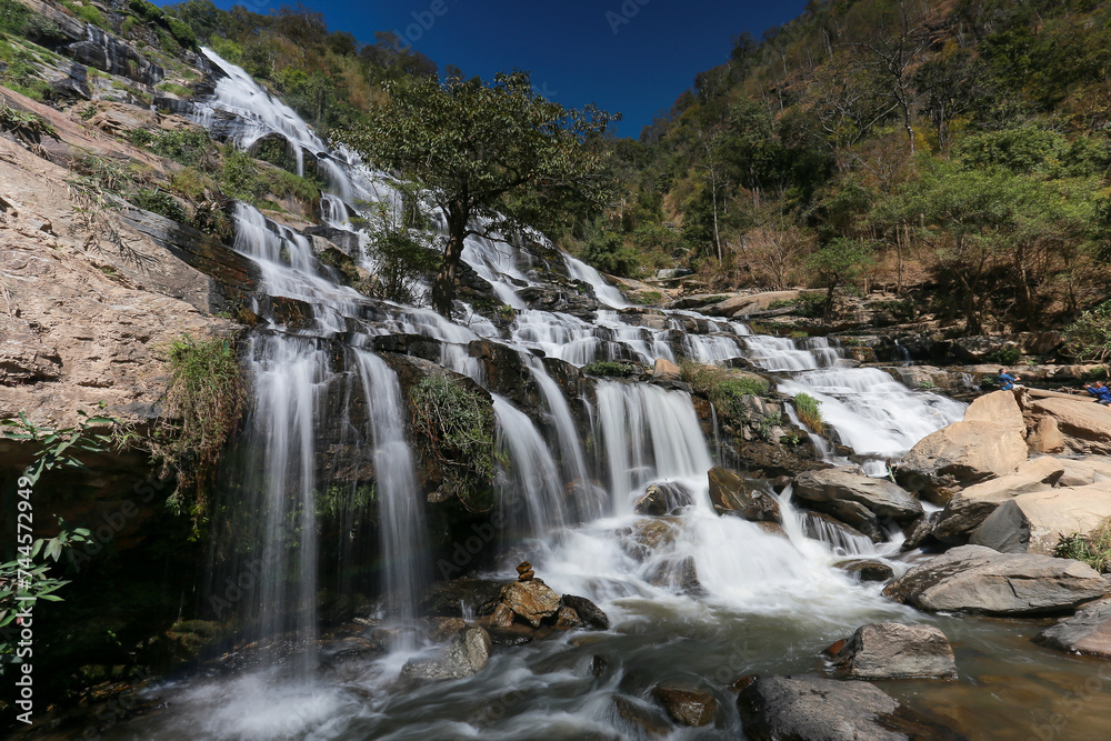 Mae Ya Waterfall in Chiang Mai Province is a beautiful waterfall with water all year round and very high. Waterfall in a beautiful forest park in Thailand In February 2024