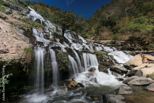 Mae Ya Waterfall in Chiang Mai Province is a beautiful waterfall with water all year round and very high. Waterfall in a beautiful forest park in Thailand In February 2024