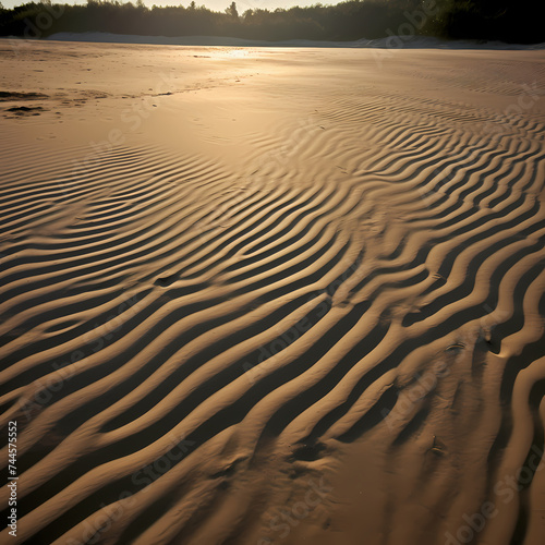 Shadows and light creating patterns on a beach.
