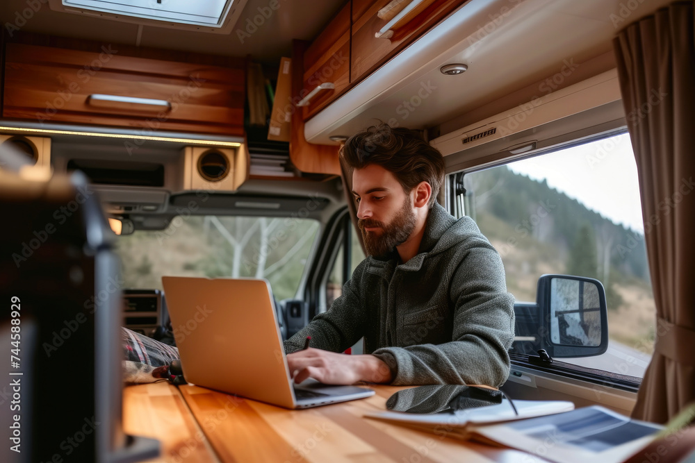 Handsome Digital Nomad Thriving in Sleek Mobile Home Handsome Digital Nomad Thriving in Sleek Mobile Home