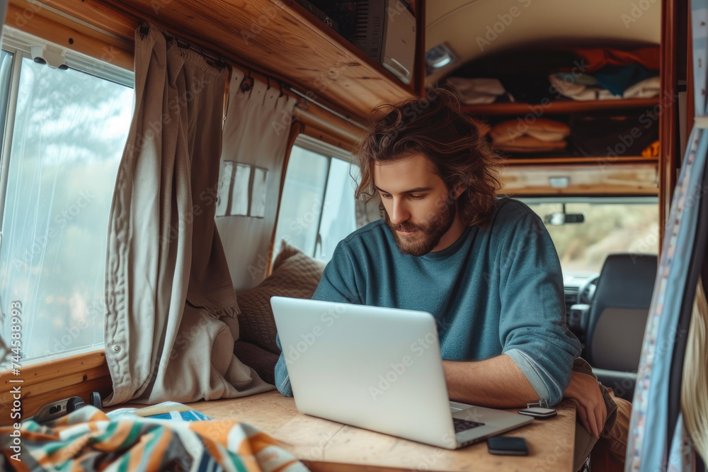 Fototapeta premium Nomadic Innovator: Handsome Digital Professional Crafting Success from Mobile Haven