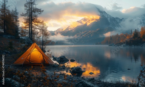 Amidst a serene winter landscape, a tent stands tall on the edge of a misty lake, surrounded by towering trees and the soft glow of a colorful sunrise