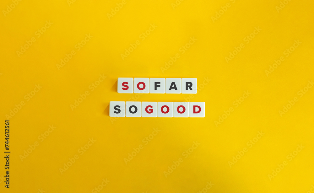 So Far, So Good Idiomatic Expression. Text on Block Letter Tiles on Flat Background. Minimalist Aesthetics. So Far, So Good Idiomatic Expression. Text on Block Letter Tiles on Flat Background. Minimalist Aesthetics.