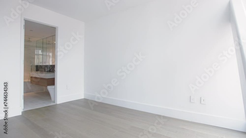 Panning shot of an empty bedroom in a New York City luxury apartment