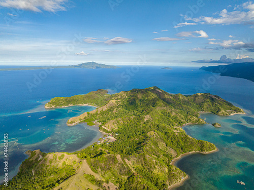 Fototapeta Naklejka Na Ścianę i Meble -  Beautiful sea landscape with turquoise water. Blue sky and clouds. Mati, Davao Oriental. Philippines.