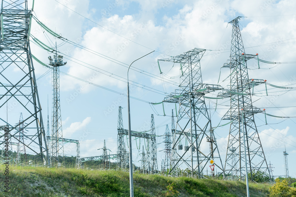 custom made wallpaper toronto digitalHigh voltage towers with sky background. Power line support with wires for electricity transmission. High voltage grid tower with wire cable at distribution station. Energy industry, energy saving