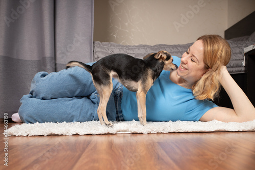 Dog and woman at home, canine friendship, happy pet owner, cozy lifestyle