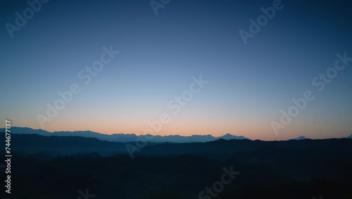 In the morning, smoke curls up from the valley and the bamboo forest is green. The Erliao tribe in Zuozhen enjoys the sunrise landscape, Tainan City, Taiwan. photo