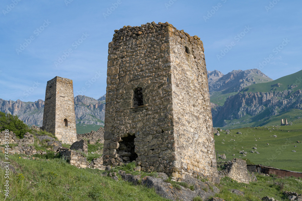 Ancient Ossetian defensive towers on a sunny June morning. Tsmiti, North Ossetia-Alania. Russian Federation