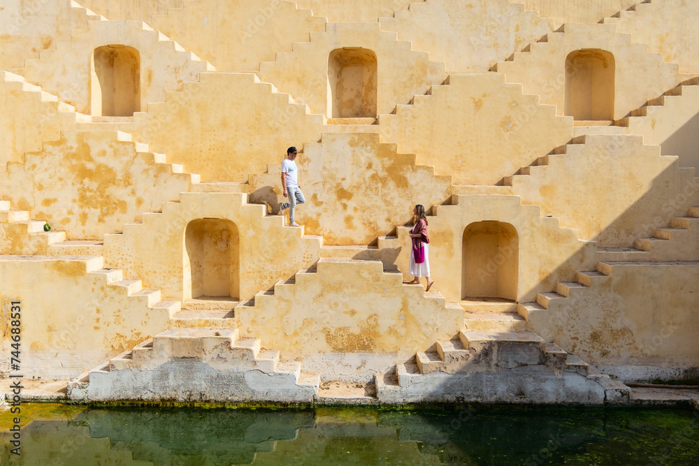 Couple at ancient stepwell in Jaipur