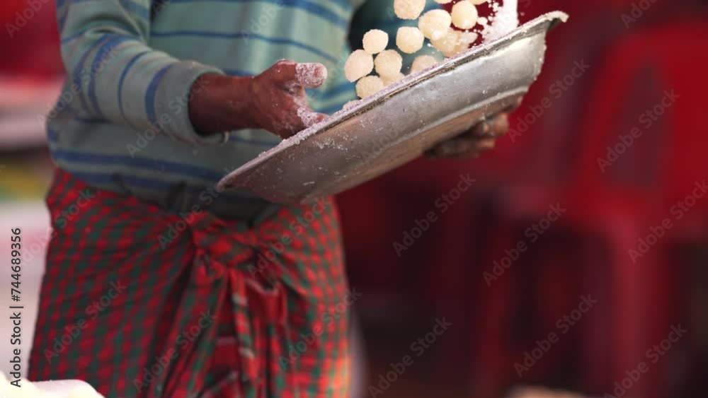Art of making Rasgulla, a delightful Indian dessert made from milk ...