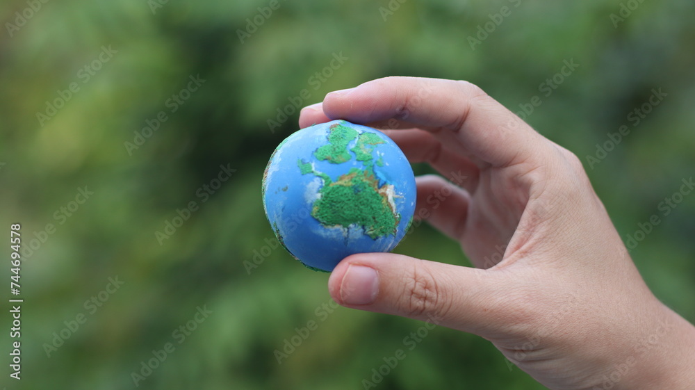 Environment Earth Day In the hands holding green earth on Bokeh green Background, Saving environment, and environmentally sustainable. Save Earth. Concept of the Environment World Earth Day Environment Earth Day In the hands holding green earth on Bokeh green Background, Saving environment, and environmentally sustainable. Save Earth. Concept of the Environment World Earth Day