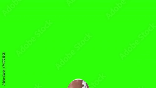 American football or rugby ball transitions on green screen. 3d animation