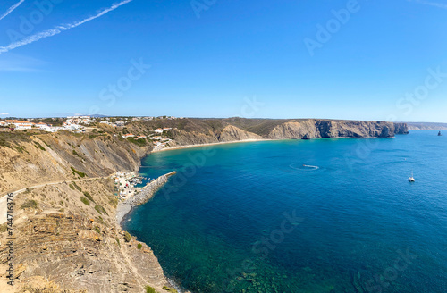 View to coastline with beautiful and sunny portuguese surfer beach Praia da Arrifana near Carrapateira in summer, Aljezur Algarve Portugal