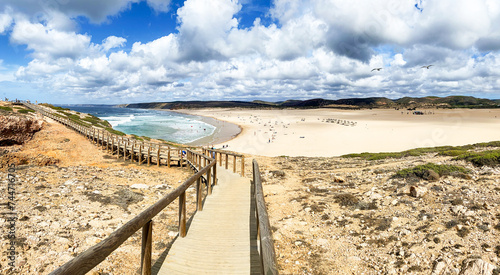 View to coastline with beautiful and sunny portuguese surfer beach Praia da Bordeira near Carrapateira in summer, Aljezur Algarve Portugal photo