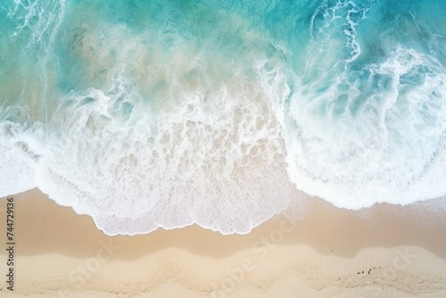 Aerial view of waves crashing on a beach, perfect for travel websites or advertisements