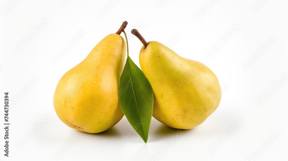 Two fresh pears with leaves on a clean white background. Suitable for food and healthy lifestyle concepts Two fresh pears with leaves on a clean white background. Suitable for food and healthy lifestyle concepts