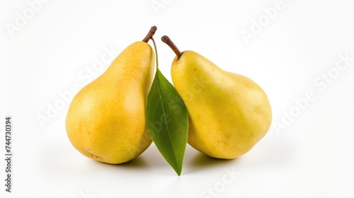 Two fresh pears with leaves on a clean white background. Suitable for food and healthy lifestyle concepts