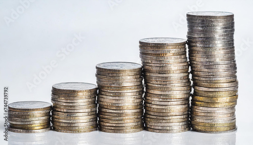 Stack of silver coins isolated on white background