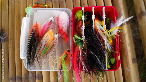 Obraz na płótnie Flyfishing box full of colorful flies - short depth of field w salonie