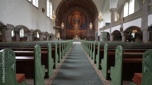 Gothenburg, Sweden - 21 April 2018 - Vasa Church in Gothenburg, Sweden. Interior of Vasa Church Vasakyrkan in Gothenburg, Sweden, Neo-Romanesque style, Scandinavia, Europe, Church with pipe organ  photo