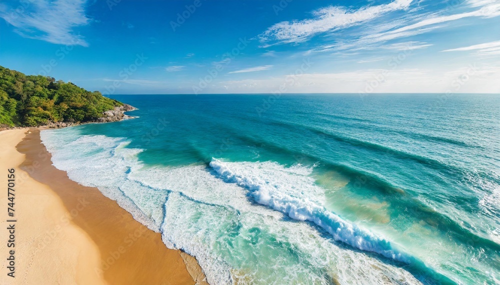 summer seascape beautiful waves blue sea water in sunny day top view from drone sea aerial view amazing tropical nature background inspirational bright sea with waves splash crash and beach sand