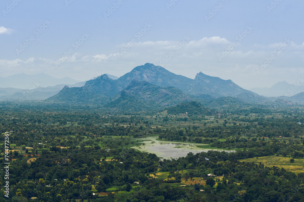 Naklejka premium Galkoth Kanda, Erawulagala, Dikkandahena mountains and Kayanwala lake view from Sigiriya rock, Sigiriya, Sri Lanka.