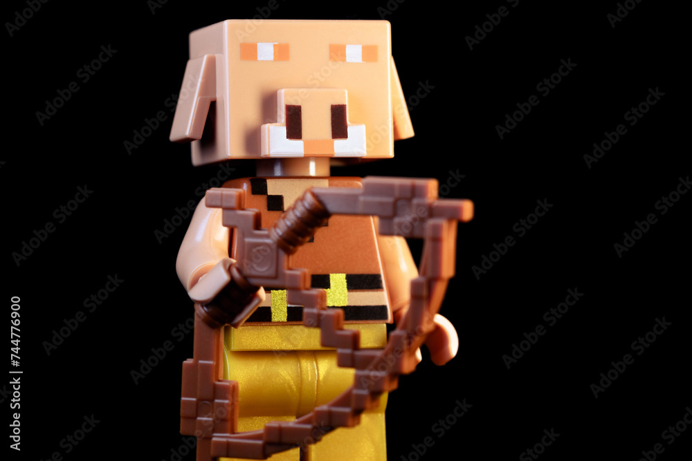 Naklejka premium LEGO Minecraft Piglin with bow and arrow. Pig face mob