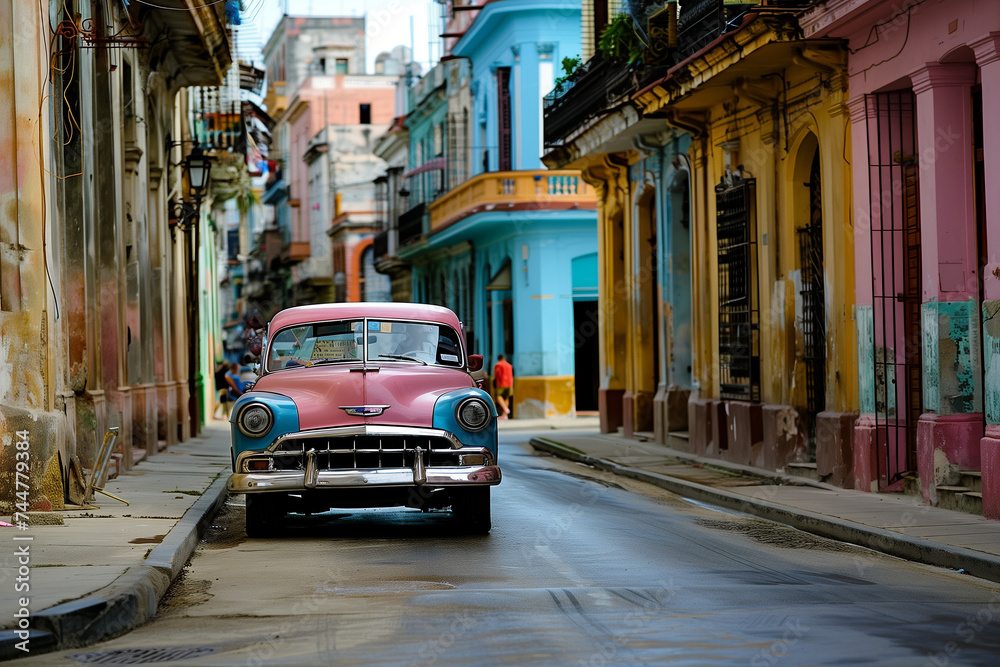 Classic cars driving down the colorful streets of Old Havana, Cuba, vibrant architecture and lively atmosphere, embodying the city's spirit and history