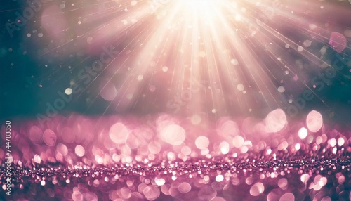 pink sparkle rays glitter lights with bokeh elegant lens flare abstract background vintage or retro tone background photo