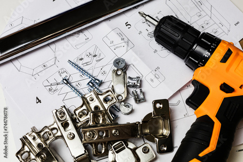 Furniture fittings. Furniture assembly hardware options and tools on a white background.