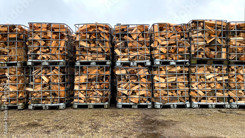 Many Prepared container firewood storage outside package store