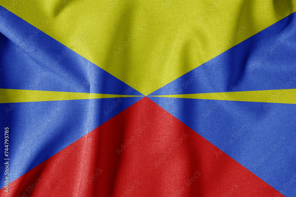 National Flag on Textured Fabric Background. Silk textured flag, realistic wave and flag look. RE Flag of Réunion National Flag on Textured Fabric Background. Silk textured flag, realistic wave and flag look. RE Flag of Réunion