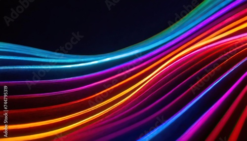abstract background of colorful neon wavy line glowing in the dark