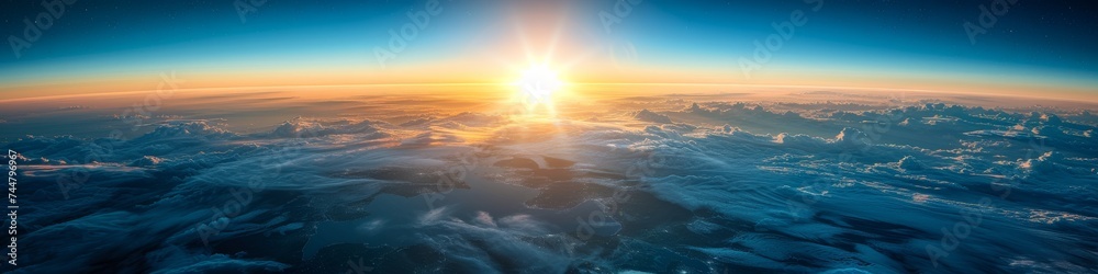 Panoramic sunrise from space, showcasing the boundary between Earth's atmosphere and the vastness of the universe
