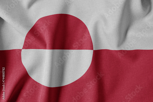 National Flag on Textured Fabric Background. Silk textured flag, realistic wave and flag look. GL Flag of Greenland